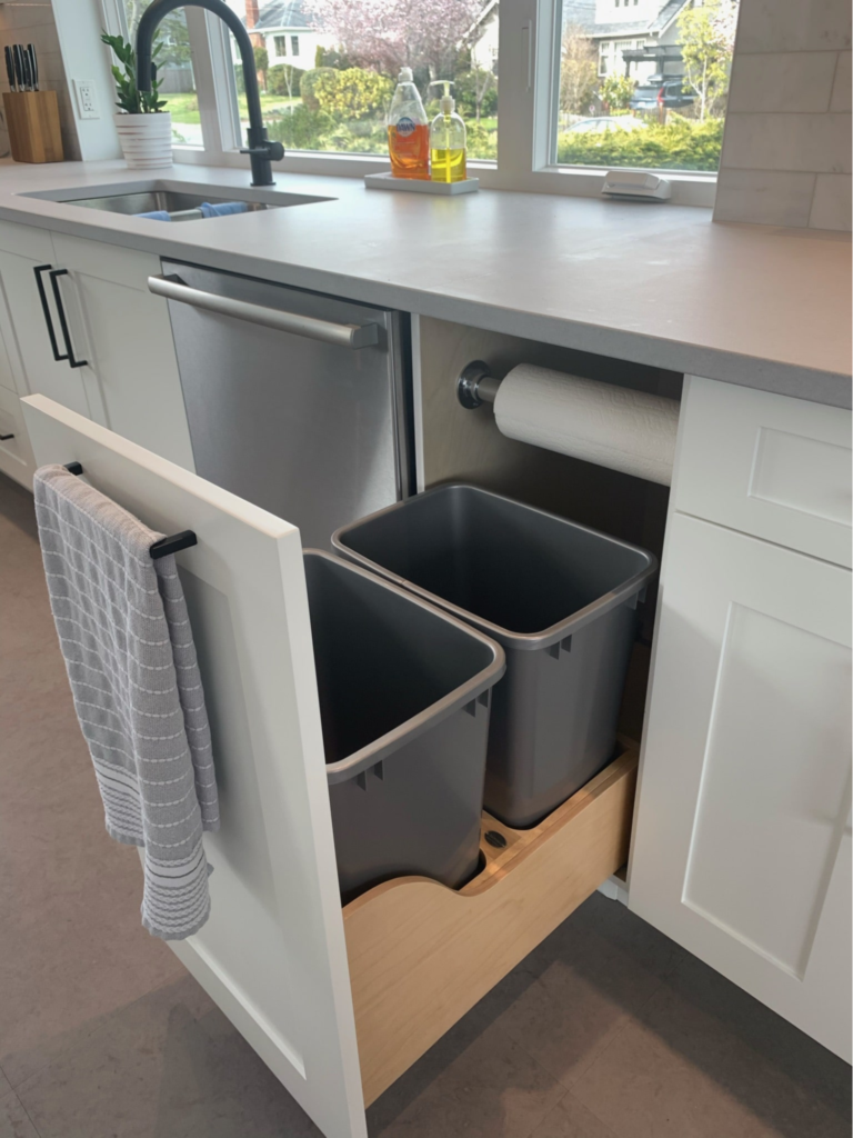 A custom woodworked cabinet inside a kitchen.